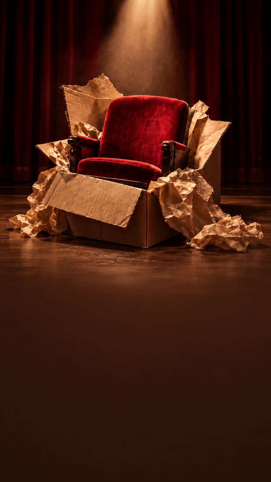 Butaca de teatro dentro de una caja de cartón abierta